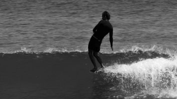 Classic longboarding style at Malibu, California